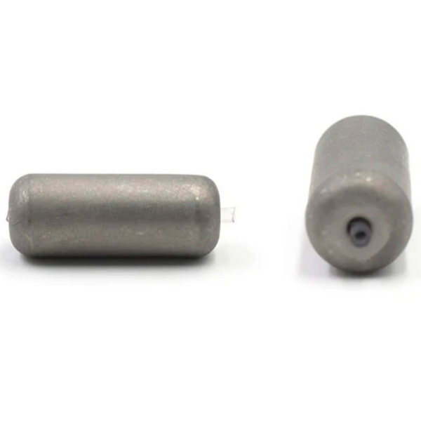 Two cylindrical tungsten carolina weights on a white background