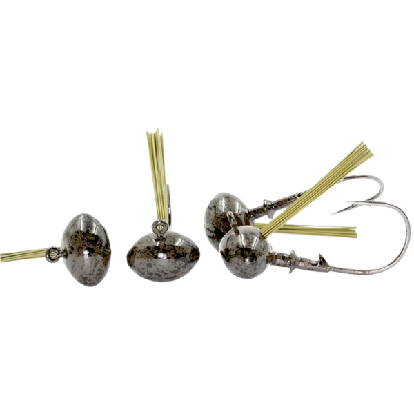 Fishing lures with hooks and feathers on a white background