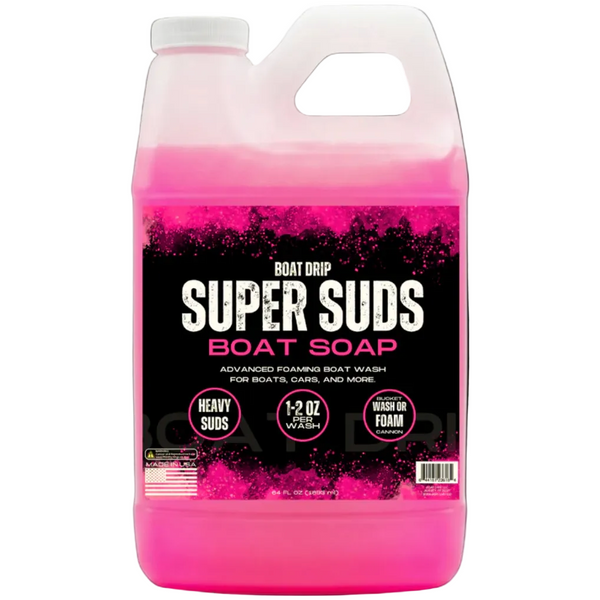 Pink bottle of Boat Drip Super Suds Boat Soap on a dark background