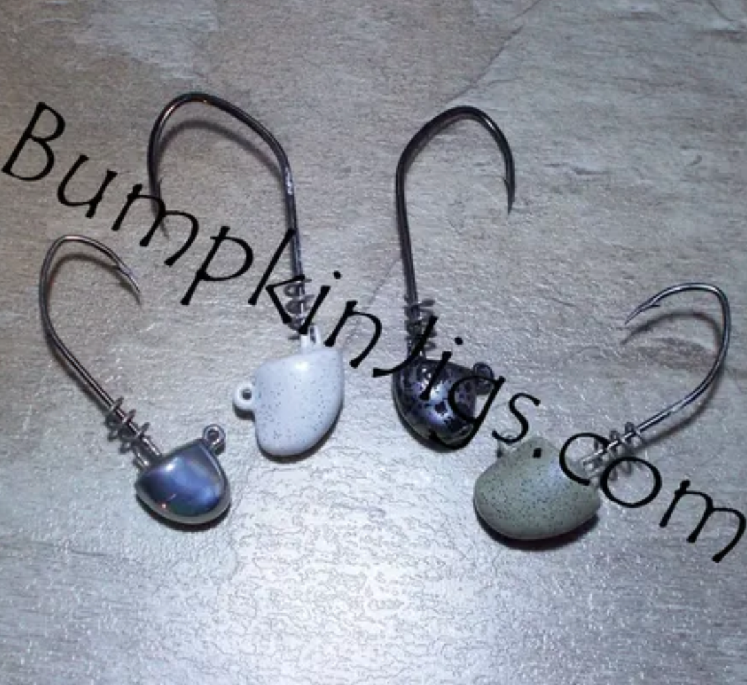 Three fishing hooks with varying designs, labeled with 'BumpkinJigs.com' on a dark background.