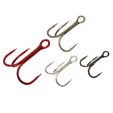 A collection of Gamakatsu Round Bend Treble Hooks in various sizes, displayed against a white background. The hooks appear in silver and red colors.