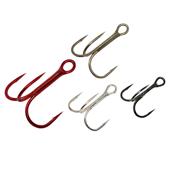 A collection of Gamakatsu Round Bend Treble Hooks in various sizes, displayed against a white background. The hooks are presented in silver, bronze, and red colors.